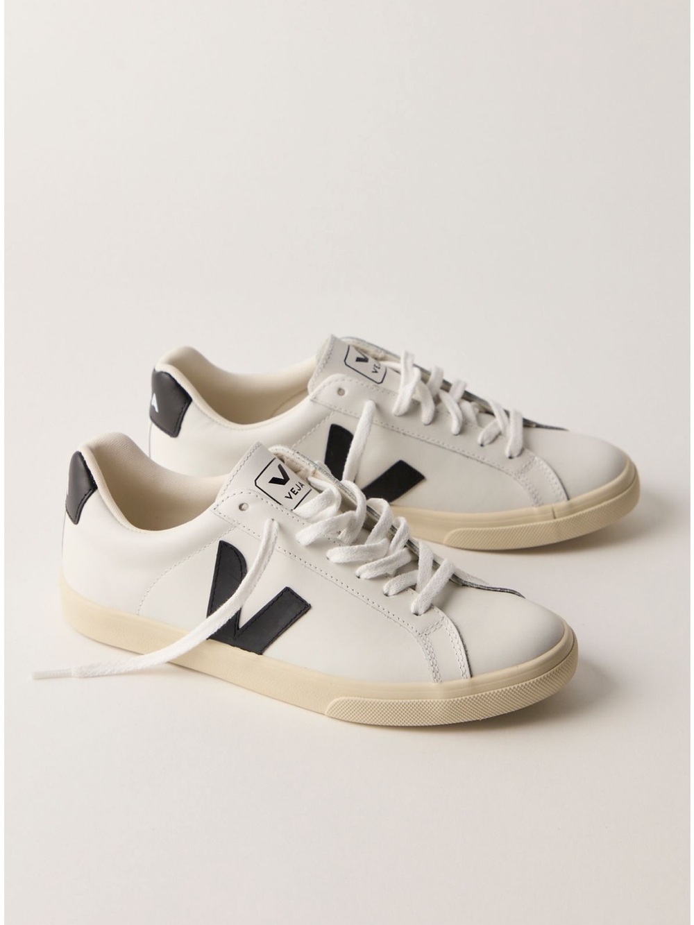 Veja women’s Esplar Low-Top Sneakers in White and Black